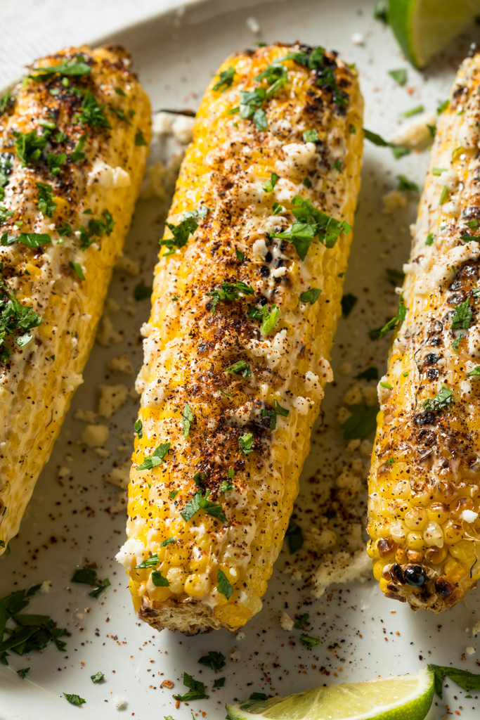 Elotes seasoned with Tinga from Todo Verde, a vegan Mexican seasoning brand.